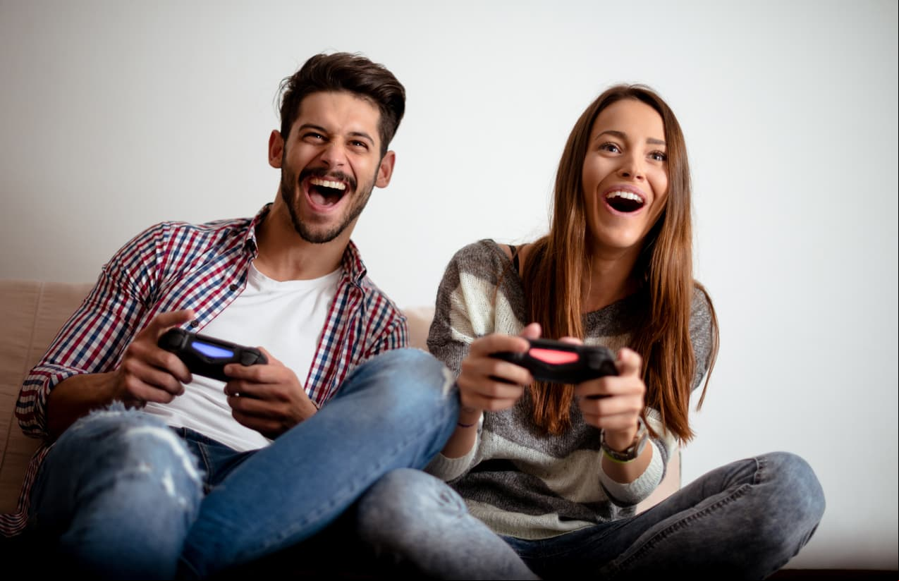 Cropped shot of a couple playing video games.