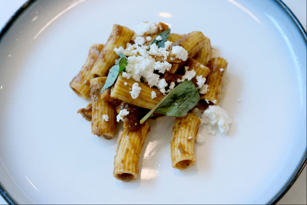 NEW YORK, NY - JULY 31: The mushroom wat pasta on display at the Booking.com's Taste Of Travel with celebrity chef Marcus Samuelsson on July 31, 2018 in New York City. (Photo by Nicholas Hunt/Getty Images for Booking.com)
