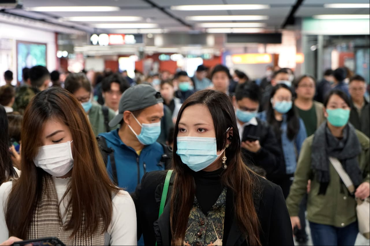 engers wear masks to prevent an outbreak of a new coronavirus in a subway station, in Hong Kong, Wednesday, Jan. 22, 2020. The first case of coronavirus in Macao was confirmed on Wednesday, according to state broadcaster CCTV. The infected person, a 52-year-old woman, was a traveller from Wuhan. (AP Photo/Kin Cheung)