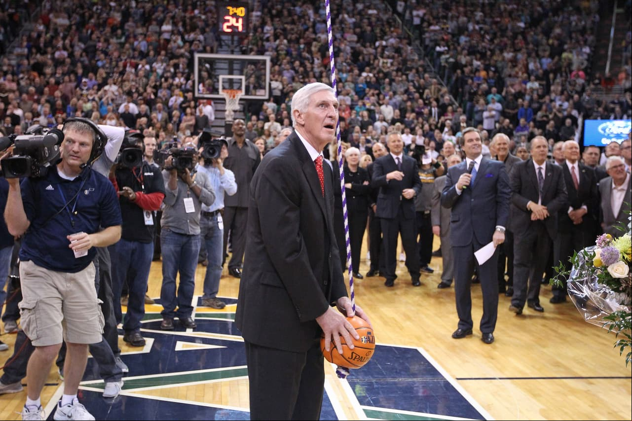 En 1988 pasó a las filas del Utah Jazz donde se mantuvo en el cargo hasta 2011 y llevó al equipo a jugar dos finales de la NBA.